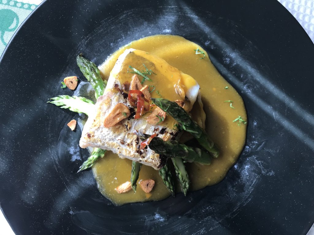 Hake with prawns and wild asparagus sauce